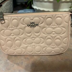 Coach Embossed Signature Wristlet in Soft Blush